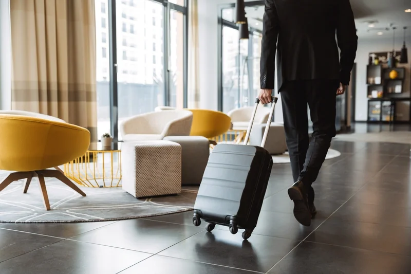 Businessman wearing a suit in a hotel lobby