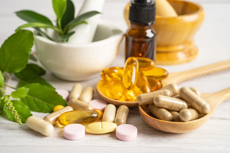 Health supplements laid out on table