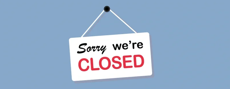 A sign that reads 'Sorry we're closed'