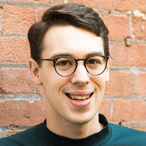 The background of the info card. Likely the portait of a person who is a teacher on the platform.