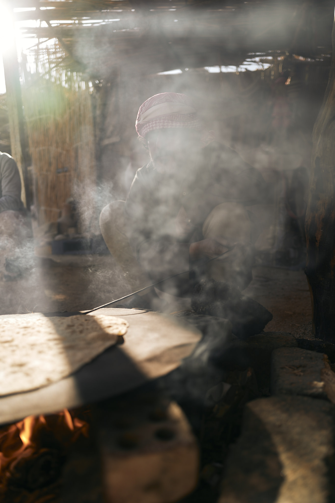 Beduin baking bread in Egypt for reportage photography in desert