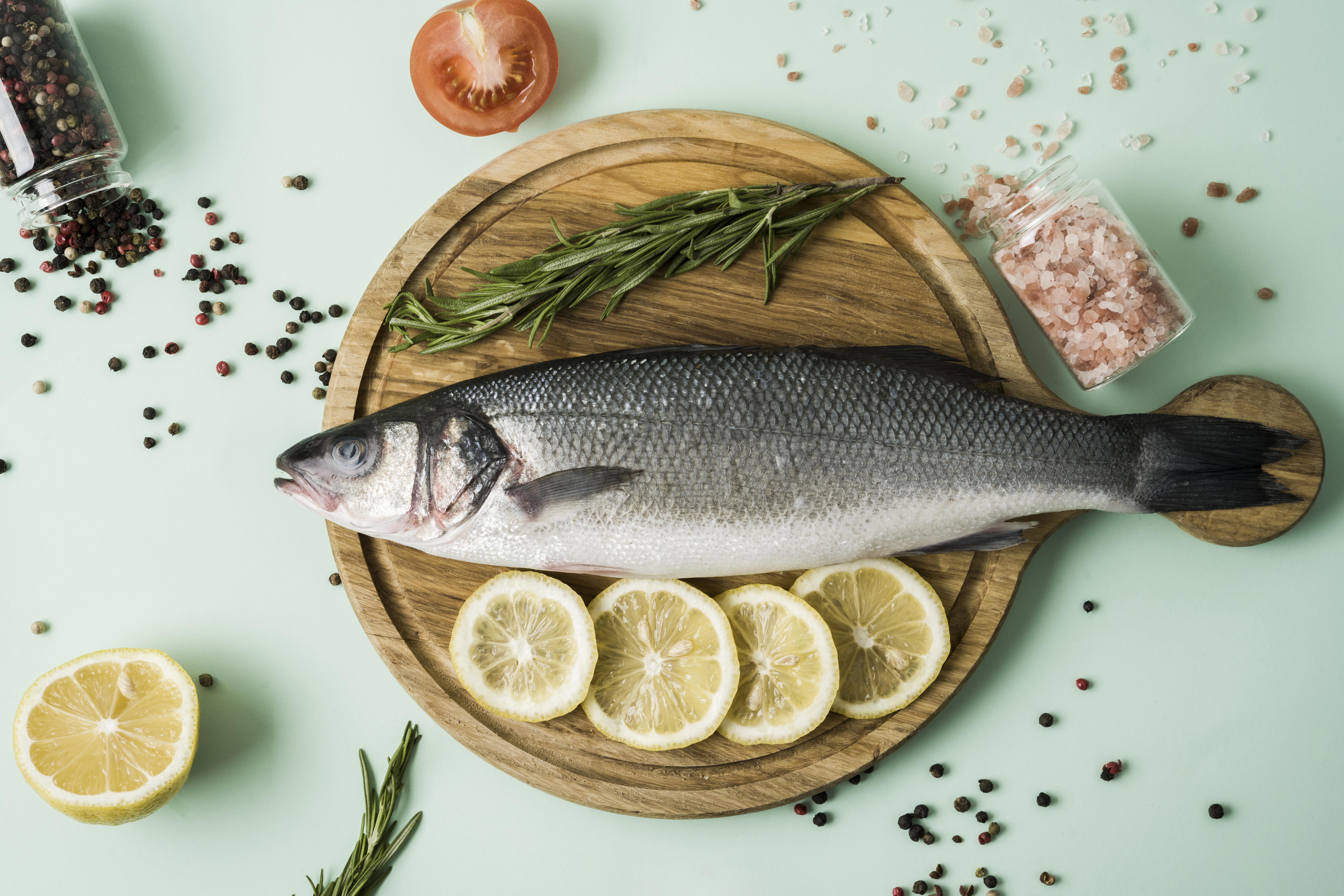 top-view-fish-with-herbs-lemon.jpg