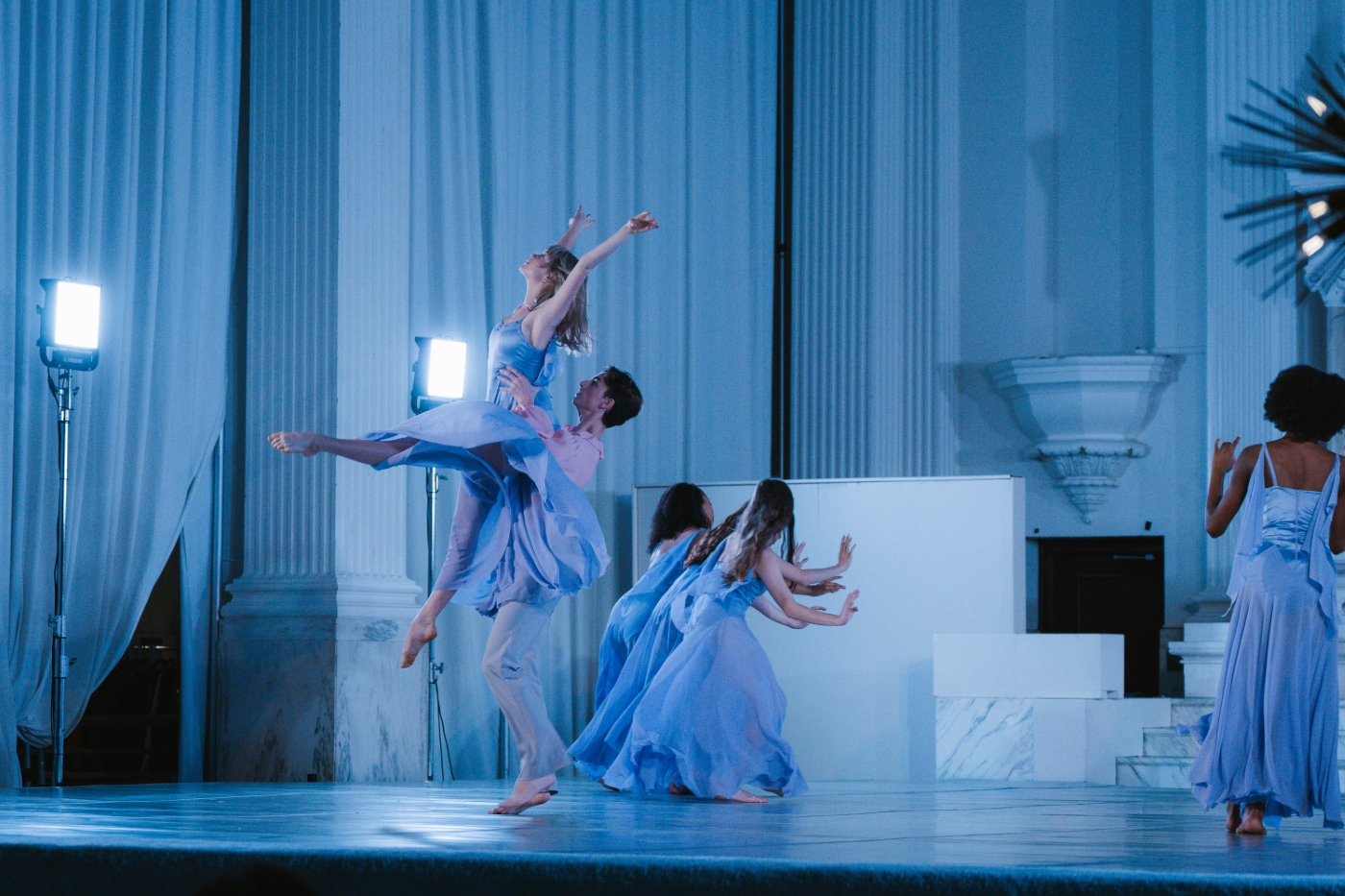 a group of dancers dressed in blue perform onstage at a dance gala at Vibiana in downtown Los Angeles