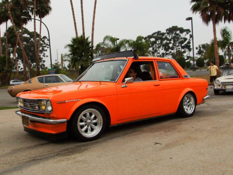 Datsun 510 orange hero ・  Photo by Wikimedia Commons