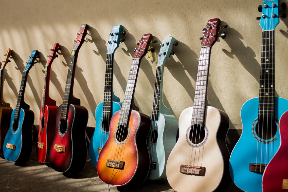 Guitars leaning against the wall outside