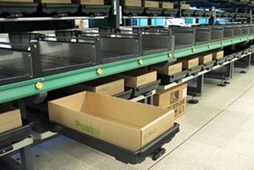 view of lots of drawers in two-tier stacker letter sorting machine with one drawer extended out on 9301 heavy duty slides.