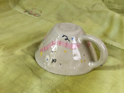 Tasse vers de terre en fête