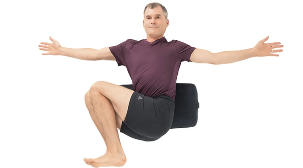 Add a bolster behind your low back