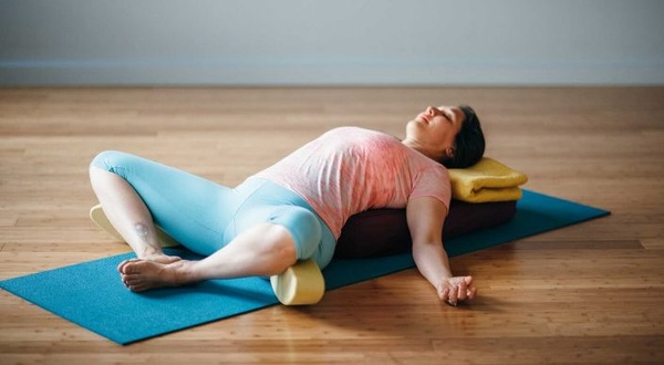 Supta Baddha Konasana (Reclining Bound Angle Pose)