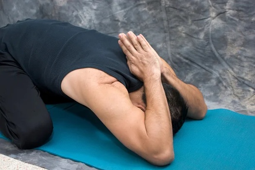 Child Pose Variation Reverse Prayer