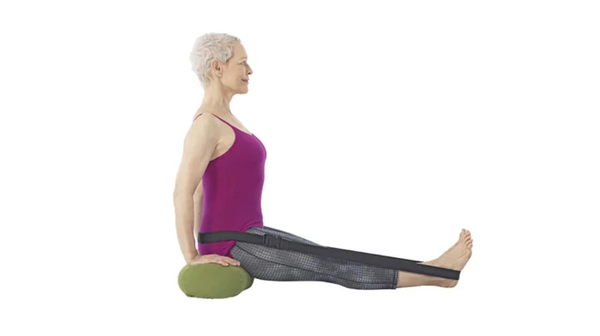 Sit on a cushion and add a yoga strap