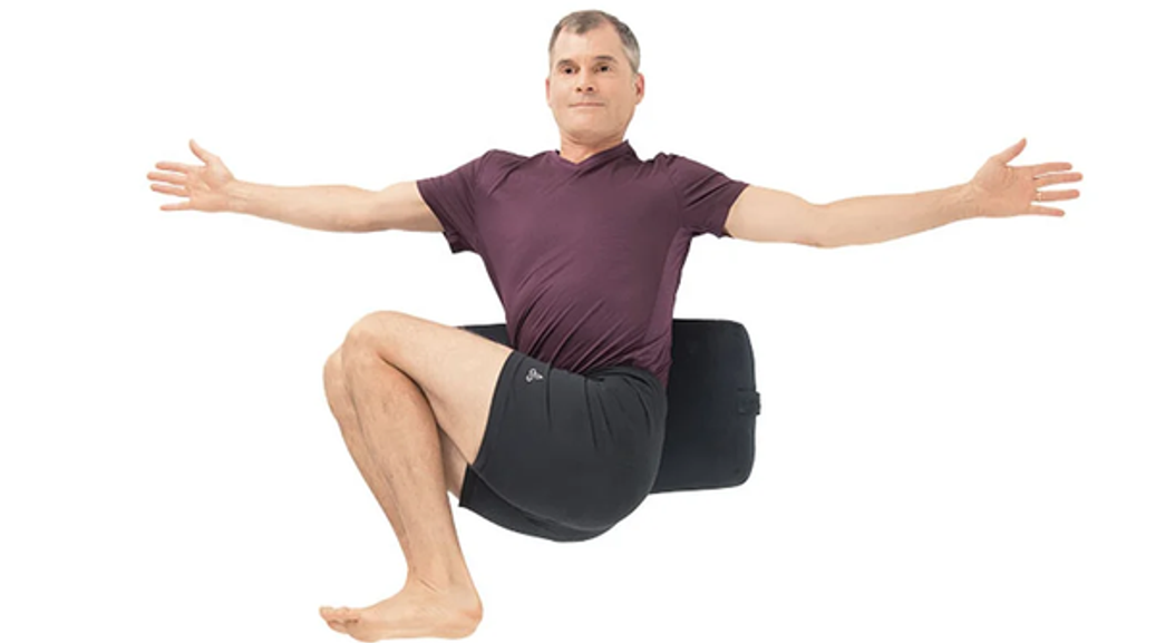 Add a bolster behind your low back