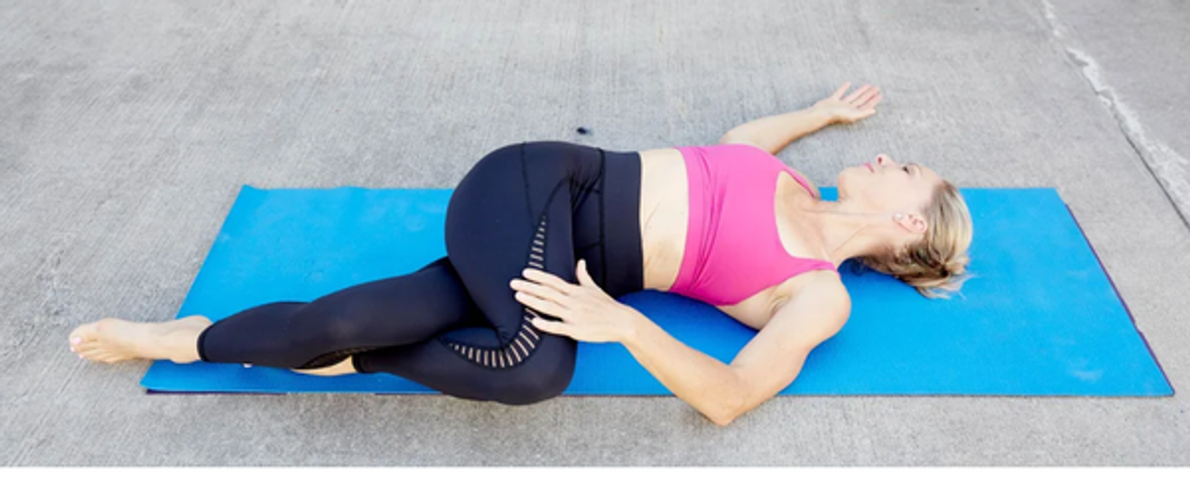 Supta Matsyendrasana (Supine Spinal Twist Pose)