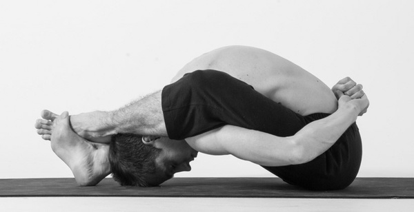 Supta Kurmasana (Reclining Turtle Pose)