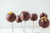 chocolate cake pops in front of a white background  
