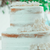naked edible white flowers wedding cake