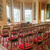 Red velvet chairs inside London wedding registry
