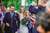 married couple walking whilst guests throw confetti 