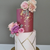 pink and gold geometric cake with roses 