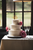 three tier wedding cake with pink flowers 