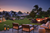 a garden lounge facing the sea during the evening in hawaii