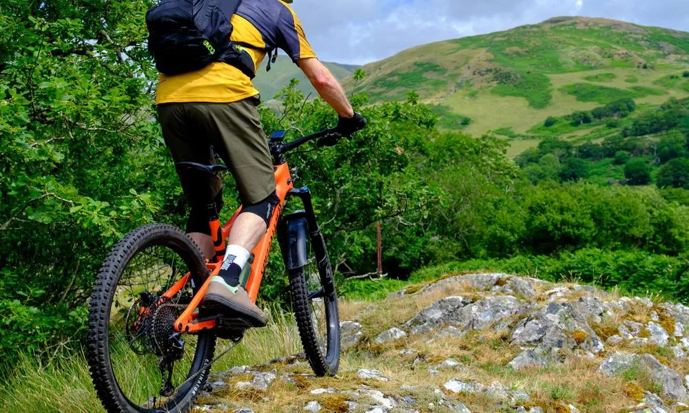 mountain biker, detail showing socks & shoes and shorts