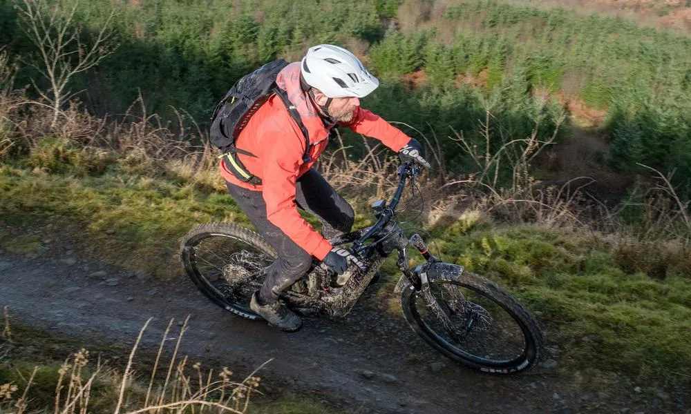 MTB rider descending on a cube