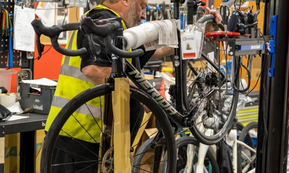 Mechanic adjusting pedals