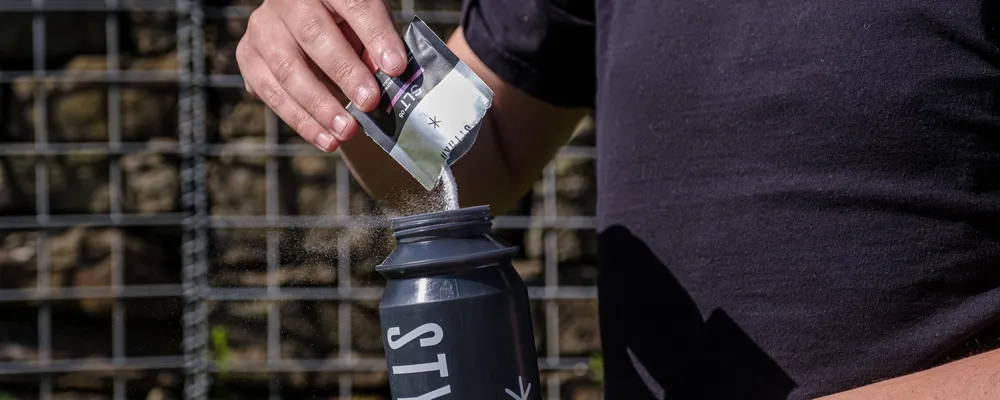 styrkr powder into bottle