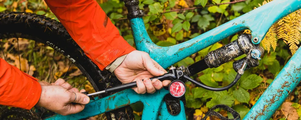 using a shock pump to adjust air pressure on a fox shock on a yeti mtb