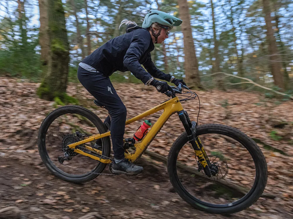 a mountain bike suspension compressing on landing