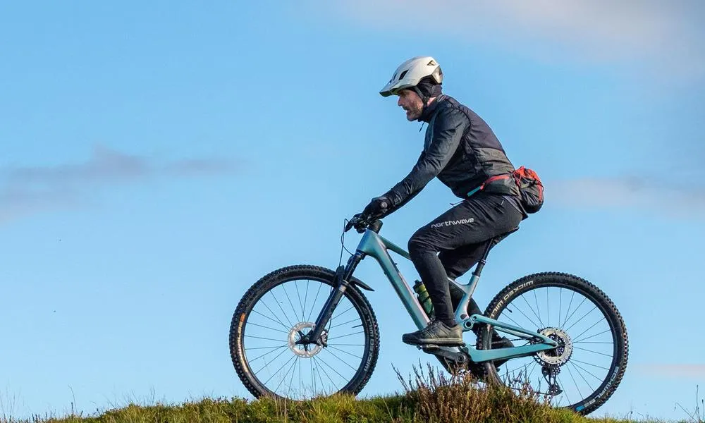 Riding an electric mountain bike on a crisp winter day