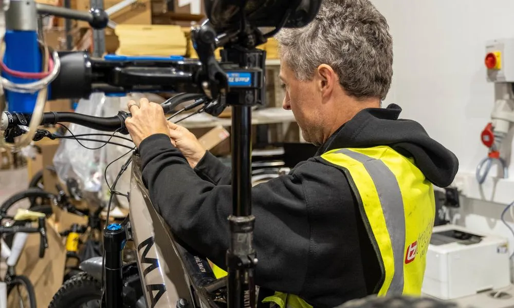 Mechanic working on Marin ebike headset