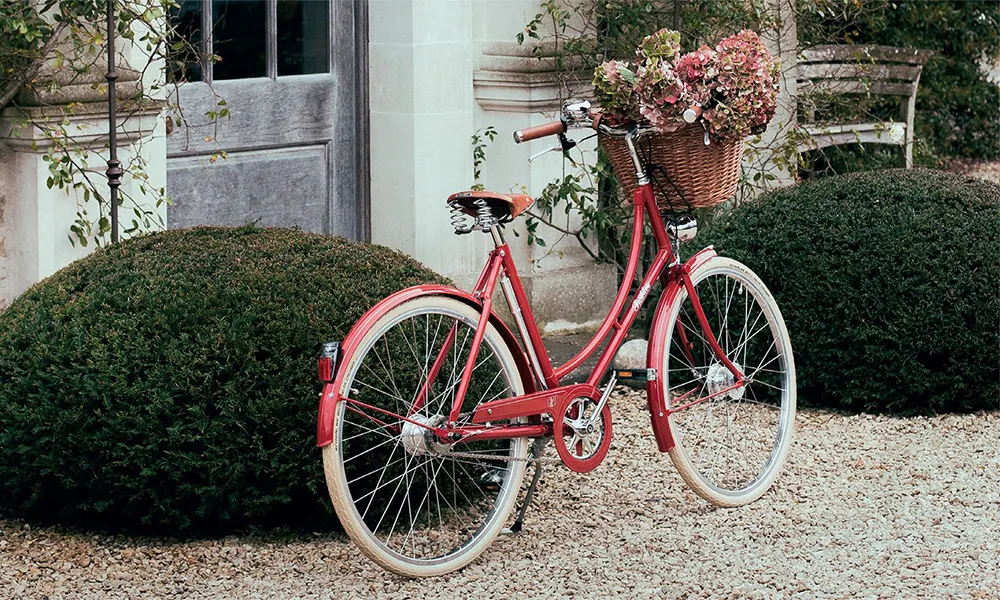 traditional bike with a basket full of flowers