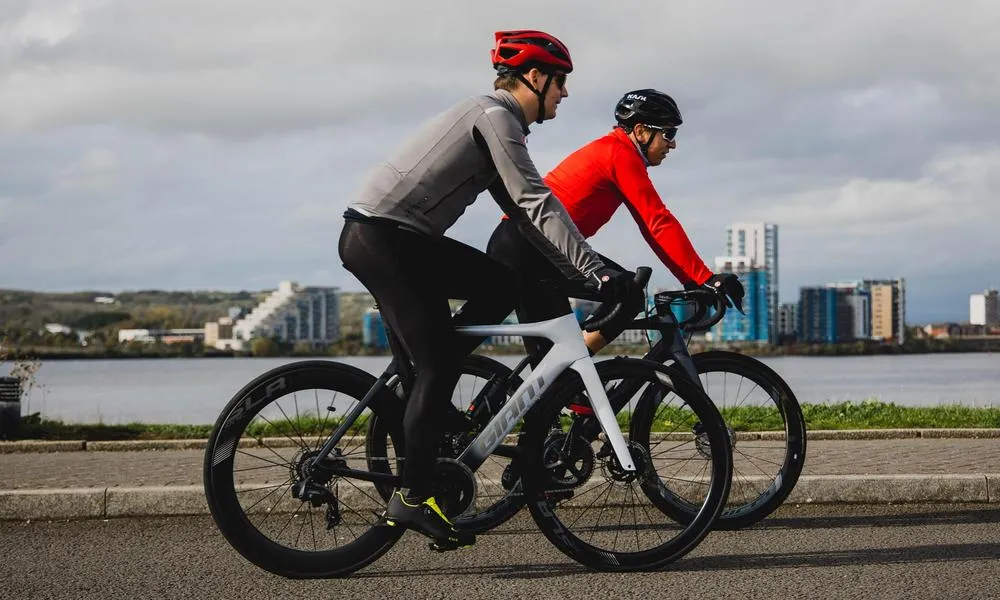 cyclists riding through dock