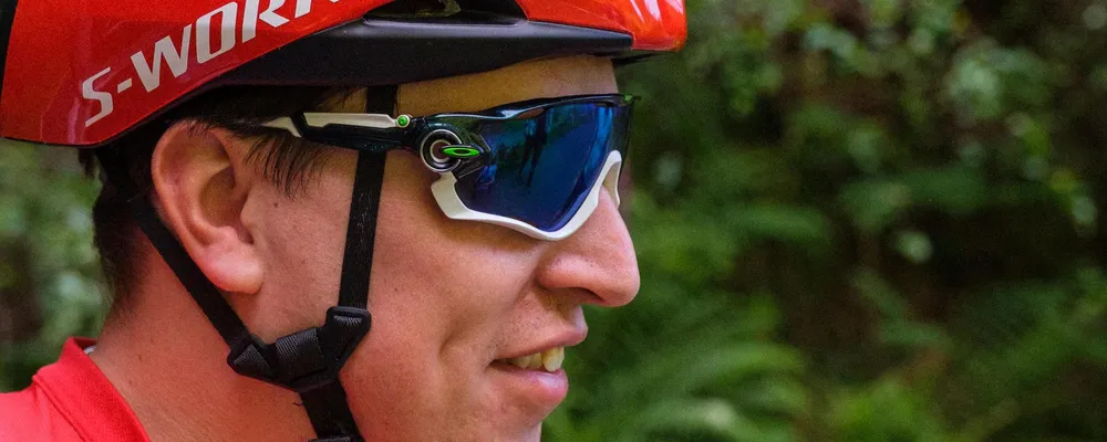 Road Cyclist wearing Oakley cycling glasses