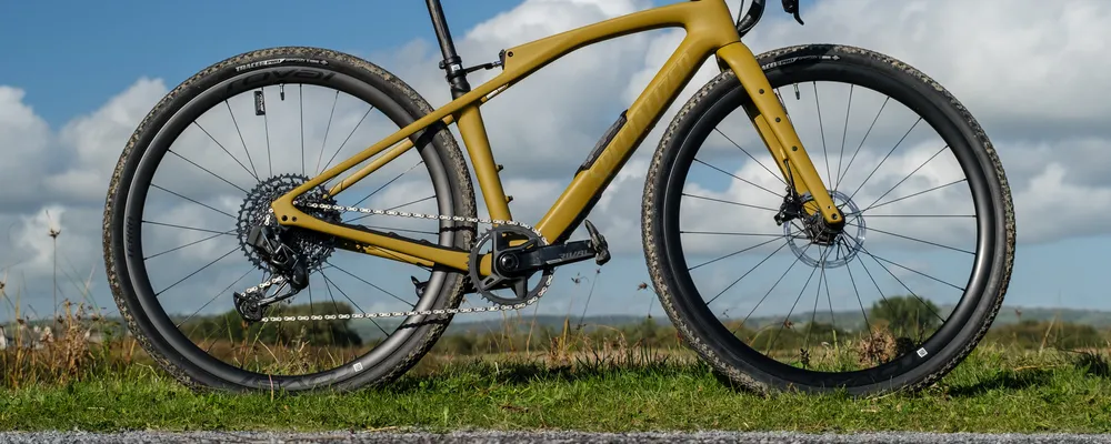 close up on bike wheels including spokes