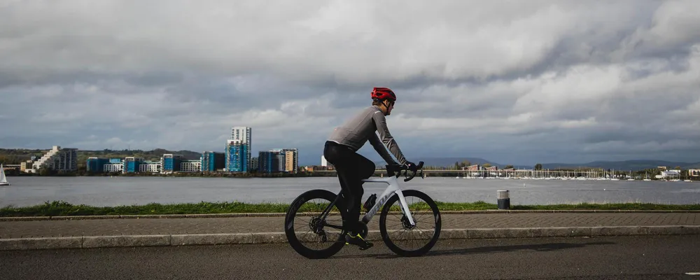 cyclist riding through docks