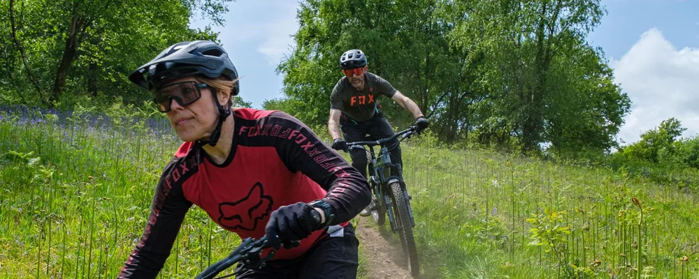 two mountain biker riding with glasses 