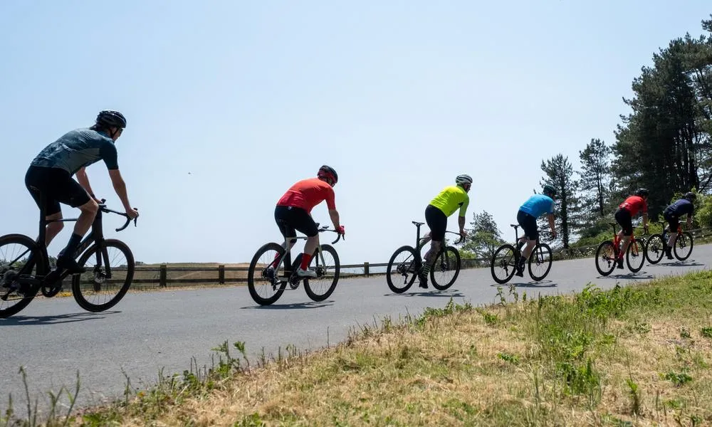 Road racers chasing around a corner