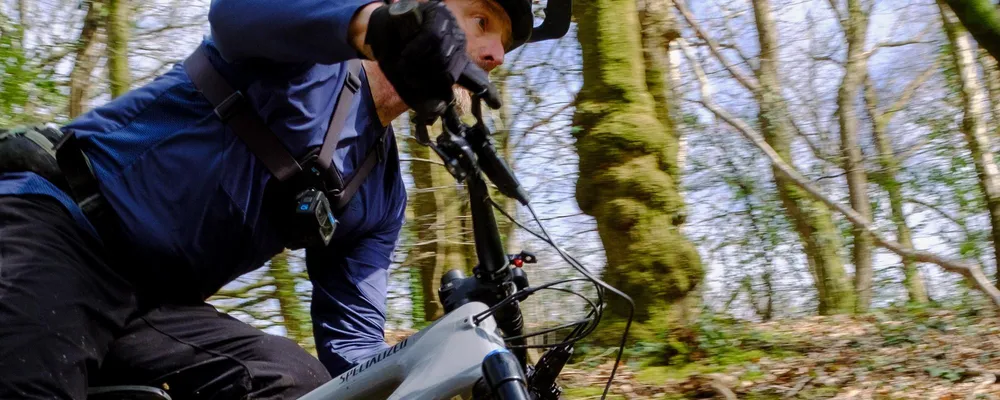 mountain biker with a go pro chest mount