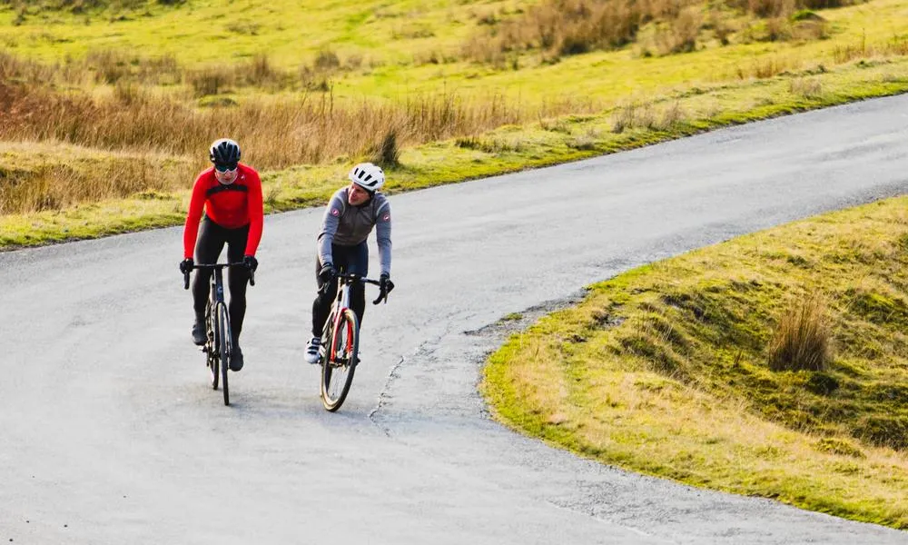 two road cyclist out on a crisp winter ride