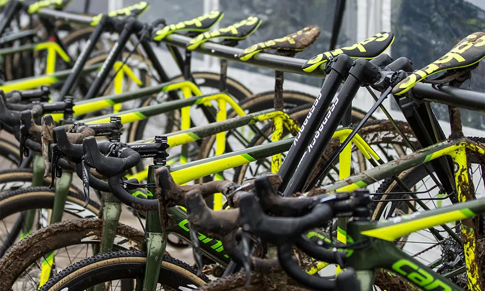 bikes beong stored on a storage rack after a race