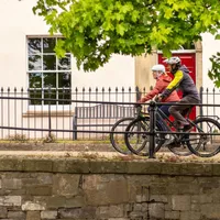 Cycle commuters riding through the city