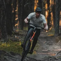 A mountain biker using Fox forks