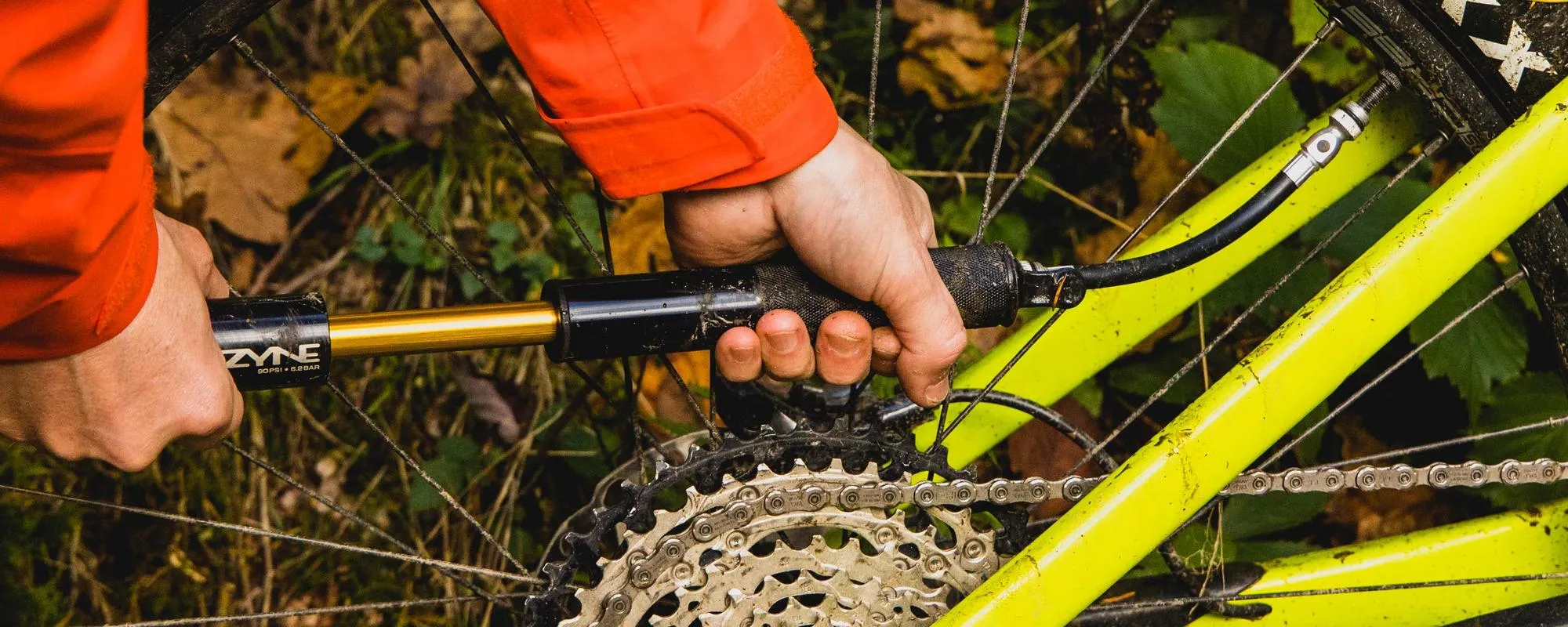 Pumping up a bike tyre with a Lezyne bike pump