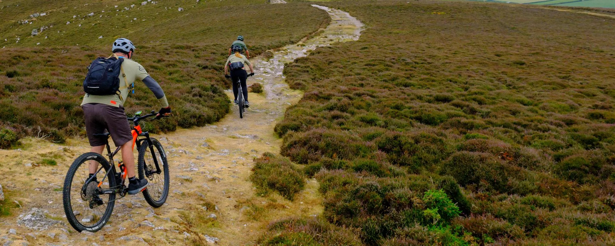 mountain bikers on mountain track