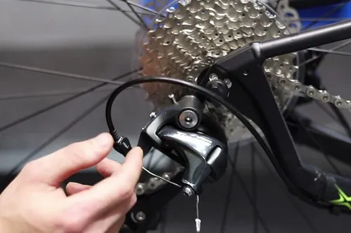 adjusting a rear derailleur on a bike 