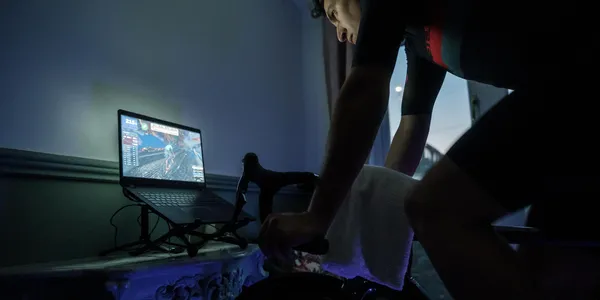 Tacx Neo 2T being used with Zwift on a laptop