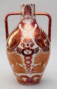 Photograph:  Two handled earthenware vase in a ruby lustre with entwined snakes and fabulous birds by William De Morgan, c.1888-1907.